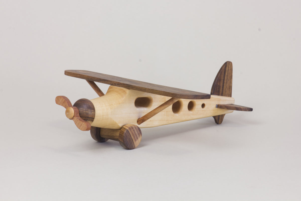 Wooden Airplane – DreamsAcademy